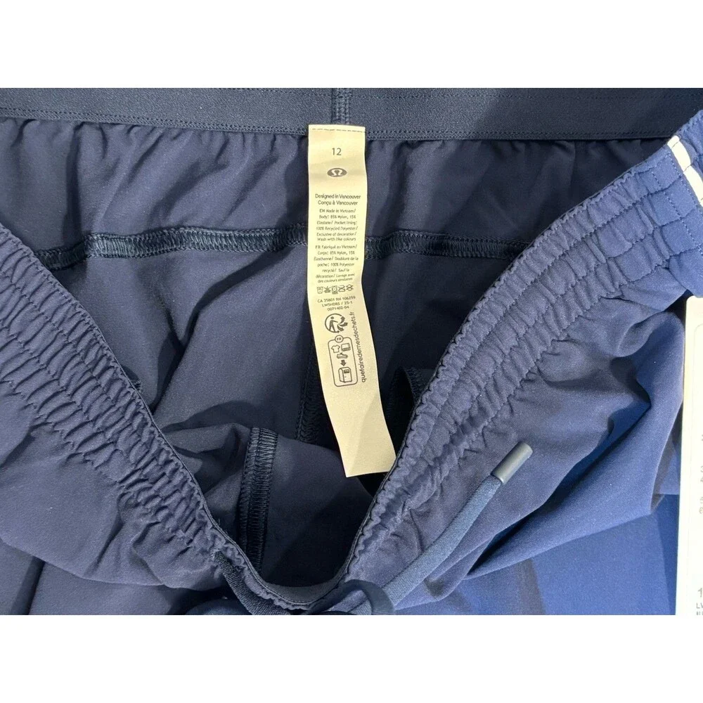 Lululemon Court Rival Wide-Leg Track Pants Size 12 NWT Club Navy White Trim